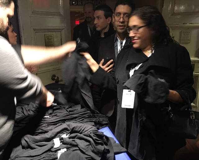 giving out shirts