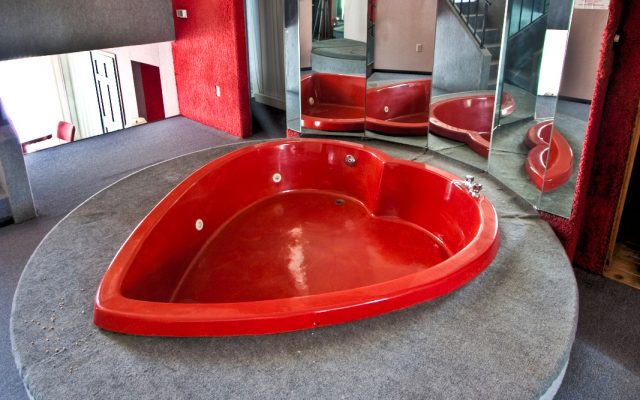 A heart-shaped bath tub at a honeymoon getaway in the Poconos